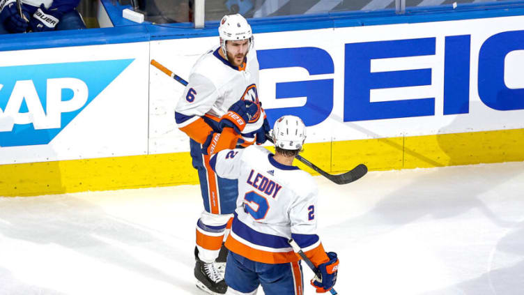 EDMONTON, ALBERTA - SEPTEMBER 15: Ryan Pulock #6 of the New York Islanders is congratulated by Nick Leddy #2 after scoring a goal against the Tampa Bay Lightning during the first period in Game Five of the Eastern Conference Final during the 2020 NHL Stanley Cup Playoffs at Rogers Place on September 15, 2020 in Edmonton, Alberta, Canada. (Photo by Bruce Bennett/Getty Images)