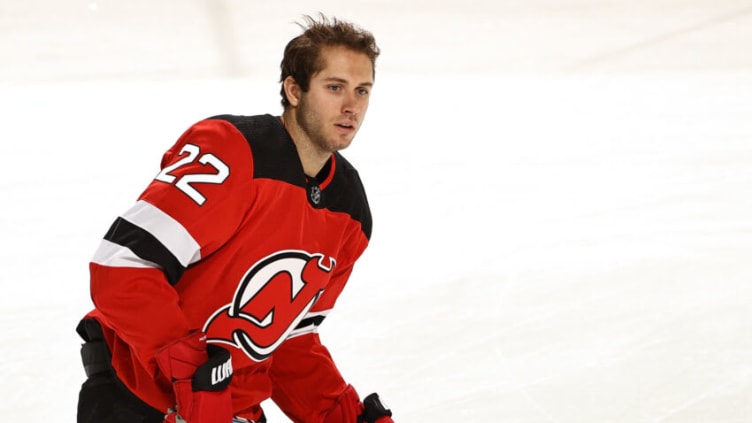 NEWARK, NEW JERSEY - JANUARY 16: Ryan Murray #22 of the New Jersey Devils skates during warm ups before the game against the Boston Bruins at Prudential Center on January 16, 2021 in Newark, New Jersey. Due to Covid-19 restrictions, the game is played without fans. (Photo by Elsa/Getty Images)