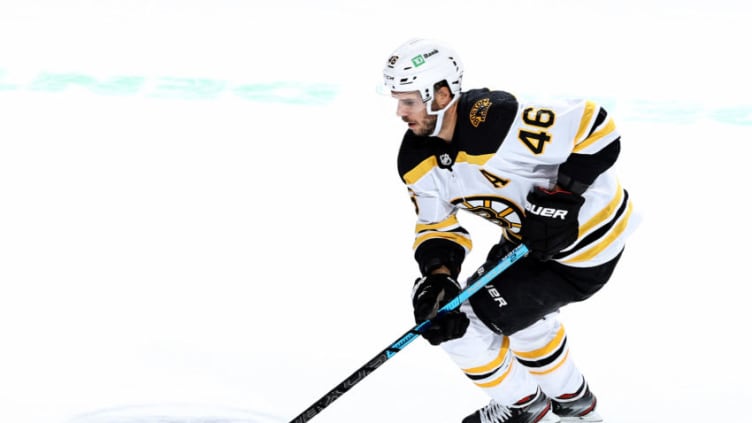 NEWARK, NEW JERSEY - JANUARY 16: David Krejci #46 of the Boston Bruins takes the puck in the overtime period against the New Jersey Devils at Prudential Center on January 16, 2021 in Newark, New Jersey. Due to Covid-19 restrictions, the game is played without fans. The New Jersey Devils defeated the Boston Bruins 2-1 in overtime. (Photo by Elsa/Getty Images)