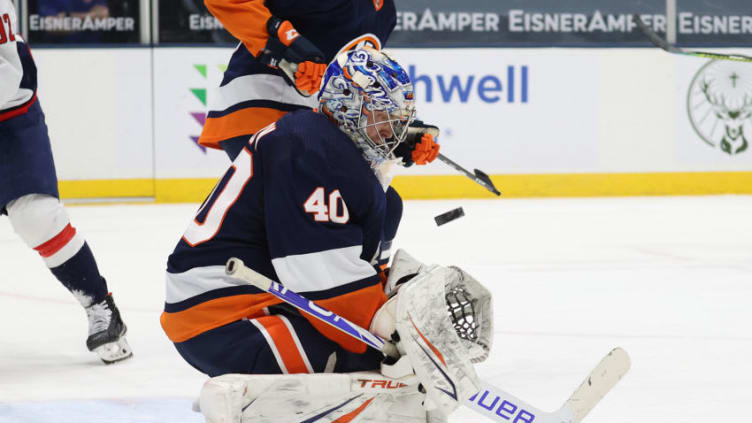 UNIONDALE, NEW YORK - APRIL 06: Semyon Varlamov #40 of the New York Islanders makes a save against the Washington Capitals during their game at Nassau Coliseum on April 06, 2021 in Uniondale, New York. (Photo by Al Bello/Getty Images)