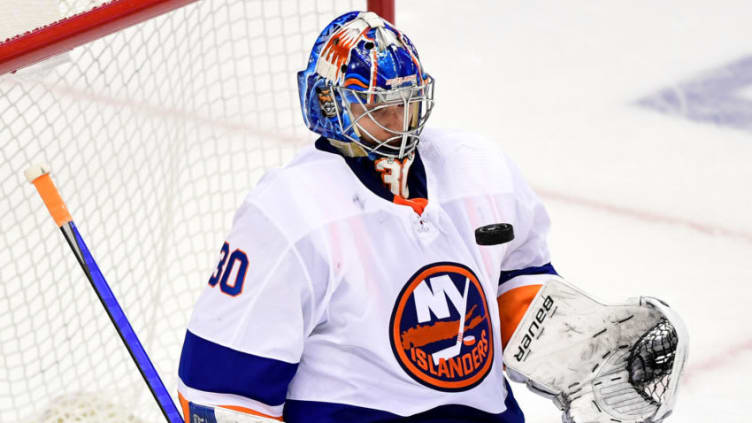 PITTSBURGH, PENNSYLVANIA - MAY 24: Ilya Sorokin #30 of the New York Islanders makes a save against the Pittsburgh Penguins during the first overtime period in Game Five of the First Round of the 2021 Stanley Cup Playoffs at PPG PAINTS Arena on May 24, 2021 in Pittsburgh, Pennsylvania. (Photo by Emilee Chinn/Getty Images)