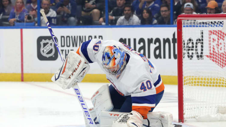 TAMPA, FLORIDA - JUNE 25: Semyon Varlamov #40 of the New York Islanders makes the save against the Tampa Bay Lightning during the first period in Game Seven of the NHL Stanley Cup Semifinals during the 2021 NHL Stanley Cup Finals at Amalie Arena on June 25, 2021 in Tampa, Florida. (Photo by Mike Carlson/Getty Images)