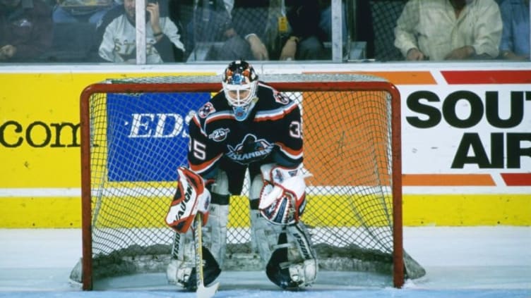 2 Apr 1997: Goaltender Tommy Salo of the New York Islanders looks on during a game against the Dallas Stars at the Reunion Arena in Dallas, Texas. The Stars won the game, 5-4. Mandatory Credit: Stephen Dunn /Allsport