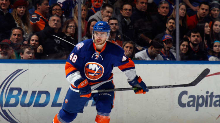 UNIONDALE, NY - FEBRUARY 27: Kael Mouillierat #48 of the New York Islanders skates against the Calgary Flames at the Nassau Veterans Memorial Coliseum on February 28, 2015 in Uniondale, New York. The Islanders defeated the Flames 2-1. (Photo by Bruce Bennett/Getty Images)