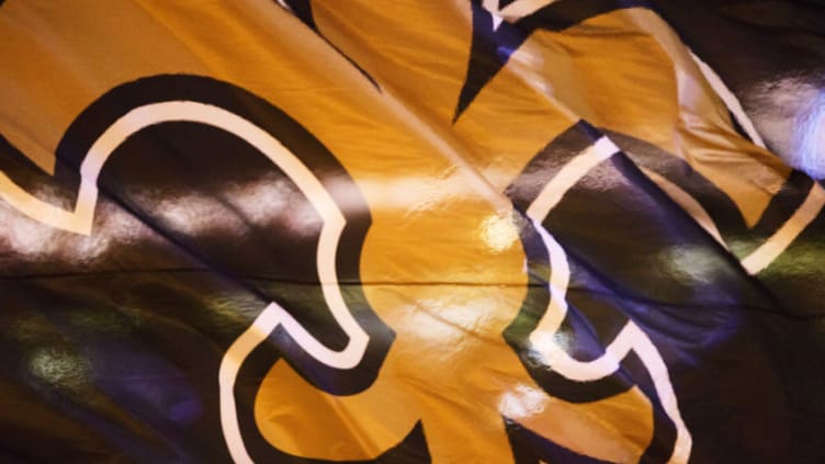NASHVILLE, TN - AUGUST 26: Flag with logo of the New Orleans Saints is run onto the field before a preseason game against the Pittsburgh Steelers at Mercedes-Benz Superdome on August 26, 2016 in New Orleans, Louisiana. The Steelers defeated the Saints 27-14. (Photo by Wesley Hitt/Getty Images)