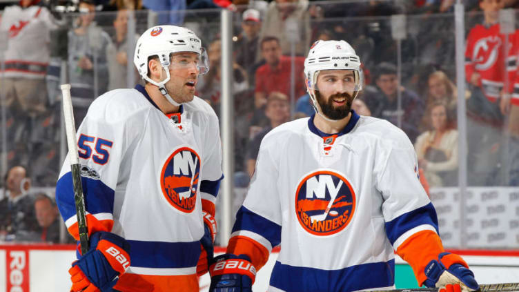 NEWARK, NJ - FEBRUARY 18: Johnny Boychuk #55 and Nick Leddy #2 of the New York Islanders in action against the New Jersey Devils on February 18, 2017 at Prudential Center in Newark, New Jersey. The Devils defeated the Islanders 3-2. (Photo by Jim McIsaac/Getty Images)