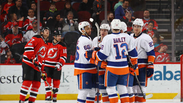 NEWARK, NJ - APRIL 08: The New York Islanders celebrate a goal by Anders Lee