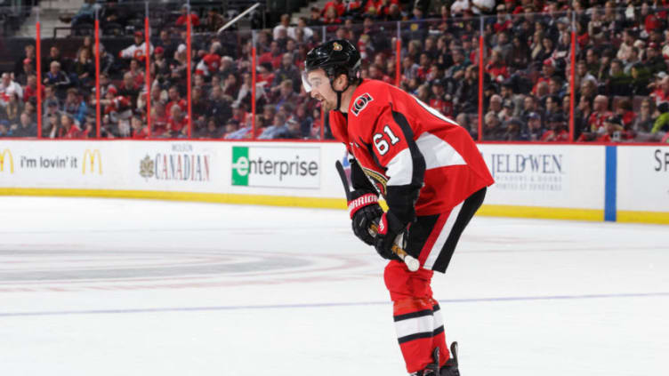 OTTAWA, ON - MARCH 9: Mark Stone #61 of the Ottawa Senators skates back slowly to the bench after a collision with a Calgary Flames player at Canadian Tire Centre on March 9, 2018 in Ottawa, Ontario, Canada. (Photo by Jana Chytilova/Freestyle Photography/Getty Images) *** Local Caption ***