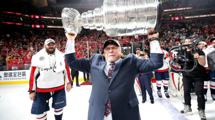 LAS VEGAS, NV - JUNE 07: Head coach Barry Trotz of the Washington Capitals hoists the Stanley Cup after his team defeated the Vegas Golden Knights 4-3 in Game Five of the 2018 NHL Stanley Cup Final at T-Mobile Arena on June 7, 2018 in Las Vegas, Nevada. (Photo by Bruce Bennett/Getty Images)