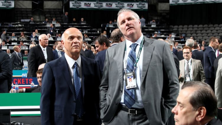 DALLAS, TX - JUNE 22: (l-r) Lou Lamoriello and Garth Snow of the New York Islanders look at the draft board prior to the first round of the 2018 NHL Draft at American Airlines Center on June 22, 2018 in Dallas, Texas. (Photo by Bruce Bennett/Getty Images)