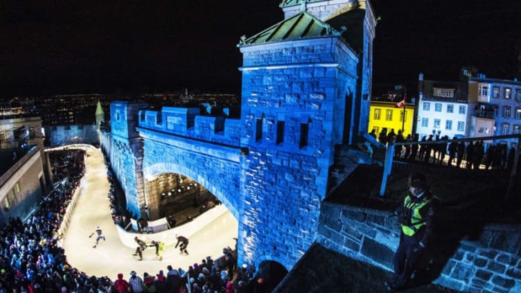 QUEBEC CITY - NOVEMBER 28: In this Red Bull handout, Pacome Schmitt of France, Coleton Haywood of Canada, Paavo Klintrup of Finland and Michael Urban of Czech Republic compete during the first stage of the Ice Cross Downhill World Championship at the Red Bull Crashed Ice in Quebec City, Canada on November 28, 2015. (Photo by Joerg Mitter/ Red Bull via Getty Images)