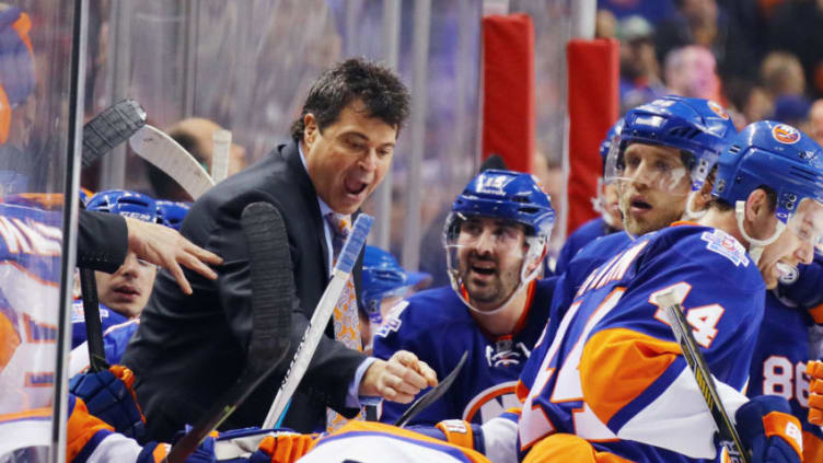 NEW YORK, NY - MARCH 14: Jack Capuano of the New York Islanders gives players instructions in the final minutes of the game against the Florida Panthers at the Barclays Center on March 14, 2016 in the Brooklyn borough of New York City. The Islanders defeated the Panthers 3-2. (Photo by Bruce Bennett/Getty Images)