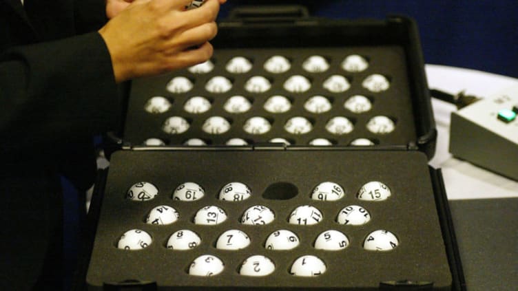 NEW YORK - JULY 22: The National Hockey League draft balls are checked prior to the lottery at the Sheraton New York Hotel and Towers on July 22, 2005 in New York City. (Photo by Andy Marlin/Getty Images for NHLI)