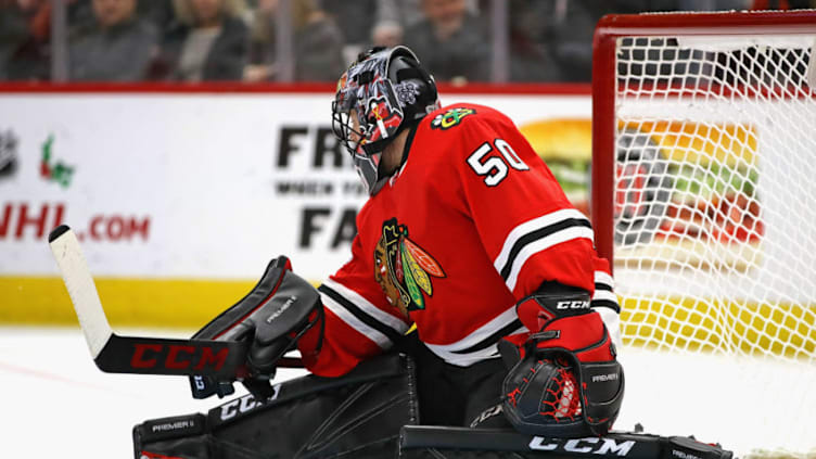 CHICAGO, IL - DECEMBER 12: Corey Crawford #50 of the Chicago Blackhawks amkes a save against the Florida Panthers at the United Center on December 12, 2017 in Chicago, Illinois. The Blackhawks defeated the Panthers 3-2 in overtime. (Photo by Jonathan Daniel/Getty Images)