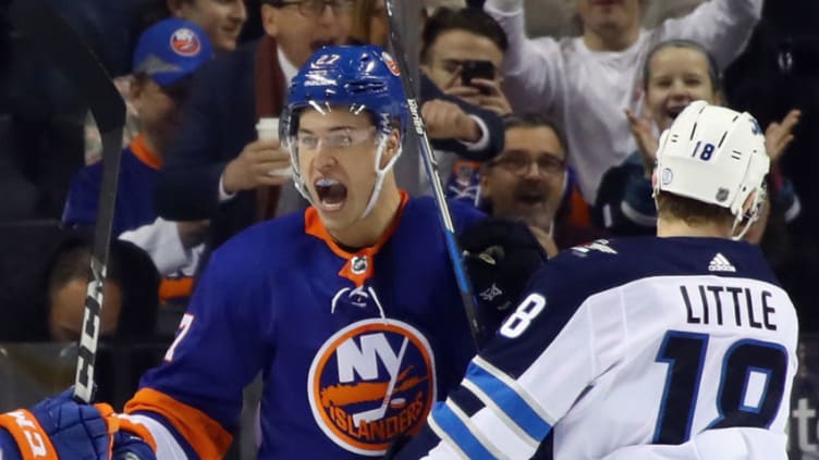 NEW YORK, NY - DECEMBER 23: Anders Lee #27 of the New York Islanders celebrates his goal at 1:31 of the first period against the Winnipeg Jets at the Barclays Center on December 23, 2017 in the Brooklyn borough of New York City. (Photo by Bruce Bennett/Getty Images)