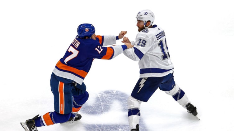 EDMONTON, ALBERTA - SEPTEMBER 11: Matt Martin #17 of the New York Islanders and Barclay Goodrow #19 of the Tampa Bay Lightning fight during the third period in Game Three of the Eastern Conference Final during the 2020 NHL Stanley Cup Playoffs at Rogers Place on September 11, 2020 in Edmonton, Alberta, Canada. (Photo by Bruce Bennett/Getty Images)