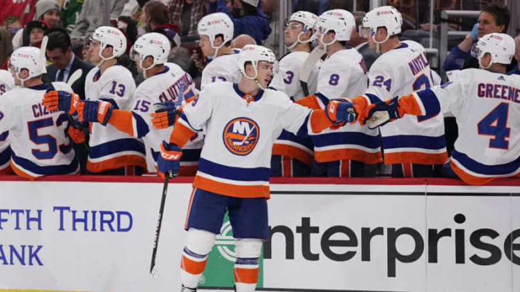 CHICAGO, ILLINOIS - OCTOBER 19: Anthony Beauvillier #18 of the New York Islanders celebrates with his teammates after scoring a goal against the Chicago Blackhawks in the second period at United Center on October 19, 2021 in Chicago, Illinois. (Photo by Patrick McDermott/Getty Images)