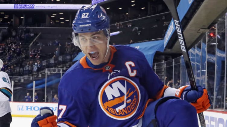 NEW YORK, NEW YORK - OCTOBER 08: Anders Lee #27 of the New York Islanders scores a powerplay goal at 14:34 of the second period against the San Jose Sharks at the Barclays Center on October 08, 2018 in the Brooklyn borough of New York City. (Photo by Bruce Bennett/Getty Images)