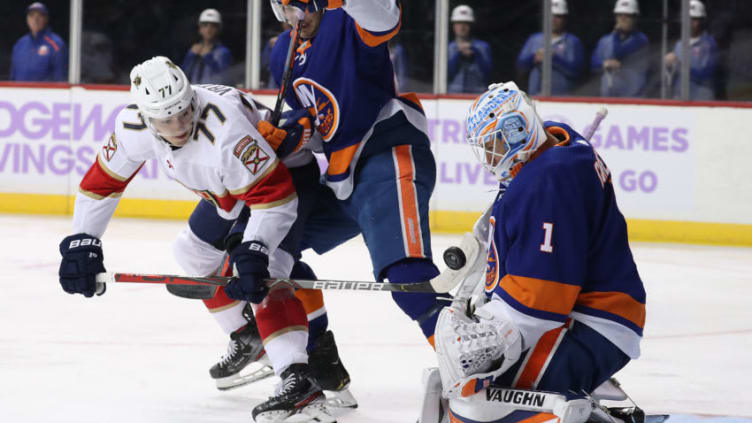 Frank Vatrano #77 of the Florida Panthers shoots against Thomas Greiss #1 of the New York Islanders (Photo by Al Bello/Getty Images)