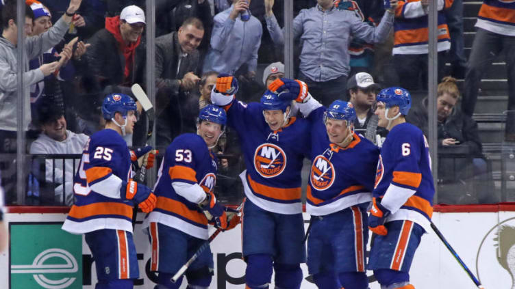 NEW YORK, NEW YORK - FEBRUARY 06: Matt Martin #17 and the New York Islanders (C) celebrate his game tying goal at 23 seconds of the third period against the Los Angeles Kings at the Barclays Center on February 06, 2020 in the Brooklyn borough of New York City. (Photo by Bruce Bennett/Getty Images)