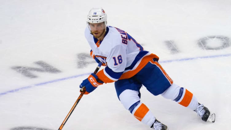 Sep 5, 2020; Toronto, Ontario, CAN; New York Islanders forward Anthony Beauvillier (18) carries the puck against the Philadelphia Flyers during game seven of the second round of the 2020 Stanley Cup Playoffs at Scotiabank Arena. New York defeated Philadelphia. Mandatory Credit: John E. Sokolowski-USA TODAY Sports