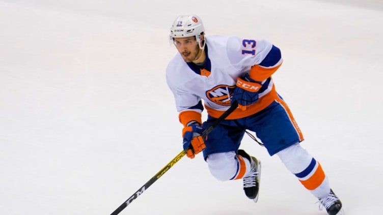 Sep 5, 2020; Toronto, Ontario, CAN; New York Islanders forward Mathew Barzal (13) carries the puck against the Philadelphia Flyers during game seven of the second round of the 2020 Stanley Cup Playoffs at Scotiabank Arena. New York defeated Philadelphia. Mandatory Credit: John E. Sokolowski-USA TODAY Sports