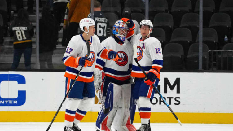 Oct 24, 2021; Las Vegas, Nevada, USA; New York Islanders goaltender Ilya Sorokin (30) is congratulated by center Anders Lee (27) and center Josh Bailey (12) after the game against the Vegas Golden Knights at T-Mobile Arena. The Islanders defeated the Golden Knights 2-0. Mandatory Credit: Kirby Lee-USA TODAY Sports