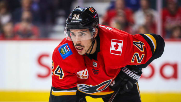 Oct 24, 2019; Calgary, Alberta, CAN; Calgary Flames defenseman Travis Hamonic (24) during the face off against the Florida Panthers during the second period at Scotiabank Saddledome. Mandatory Credit: Sergei Belski-USA TODAY Sports