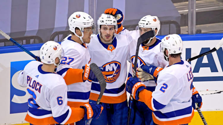 Aug 26, 2020; Toronto, Ontario, CAN; New York Islanders left wing Anders Lee (27) celebrates with teammates after scoring a goal during the second period against the Philadelphia Flyers in game two of the second round of the 2020 Stanley Cup Playoffs at Scotiabank Arena. Mandatory Credit: Dan Hamilton-USA TODAY Sports