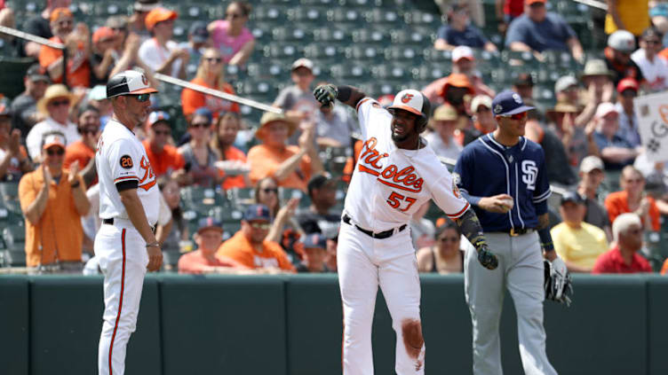 BALTIMORE, MARYLAND - JUNE 26: Hanser Alberto #57 of the Baltimore Orioles celebrates after hitting a first inning triple against the San Diego Padres at Oriole Park at Camden Yards on June 26, 2019 in Baltimore, Maryland. (Photo by Rob Carr/Getty Images)