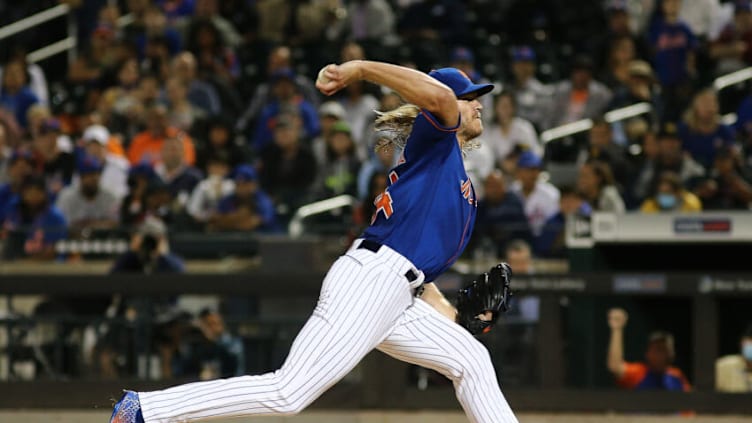 Sep 28, 2021; New York City, New York, USA; New York Mets starting pitcher Noah Syndergaard (34) throws against the Miami Marlins during the first inning of game two of a doubleheader at Citi Field. Mandatory Credit: Andy Marlin-USA TODAY Sports