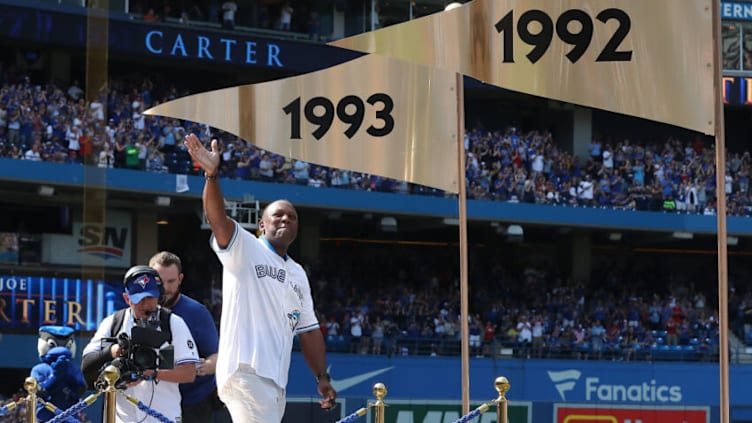 TORONTO, ON - AUGUST 11: Former player Joe Carter #29 of the Toronto Blue Jays acknowledges the fans during pre-game ceremonies marking the club's back-to-back World Series championships in 1992 and 1993 before the start of MLB game action against the Tampa Bay Rays at Rogers Centre on August 11, 2018 in Toronto, Canada. (Photo by Tom Szczerbowski/Getty Images)