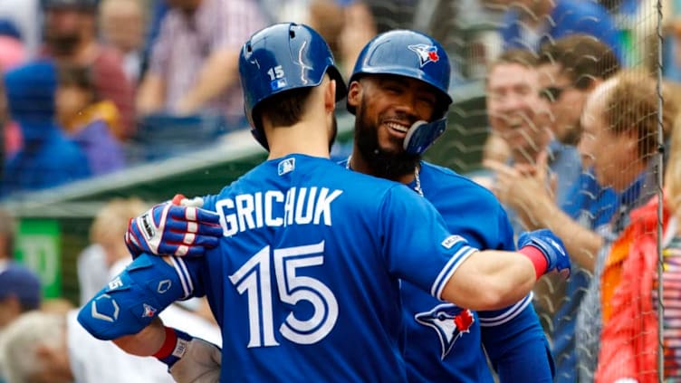 TORONTO, ON - SEPTEMBER 28: Teoscar Hernandez #37 of the Toronto Blue Jays celebrates a solo home run with Randal Grichuk #15 during first inning of their MLB game against the Tampa Bay Rays at Rogers Centre on September 28, 2019 in Toronto, Canada. (Photo by Cole Burston/Getty Images)