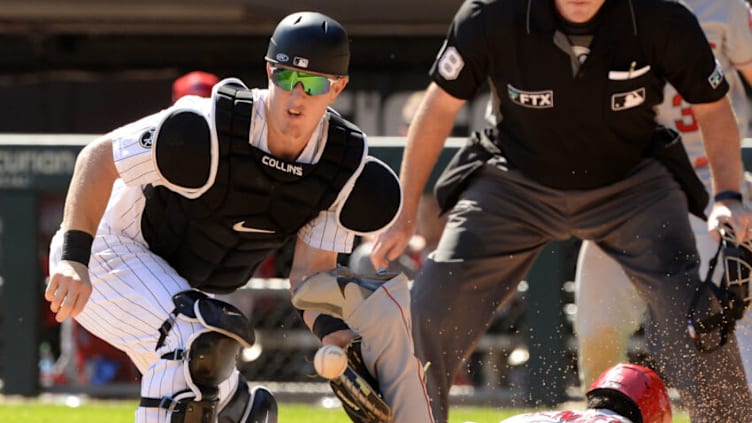 CHICAGO - SEPTEMBER 16: Zack Collins #21 of the Chicago White Sox attempts to make the tag against the Los Angeles Angels on September 16, 2021 at Guaranteed Rate Field in Chicago, Illinois. (Photo by Ron Vesely/Getty Images)