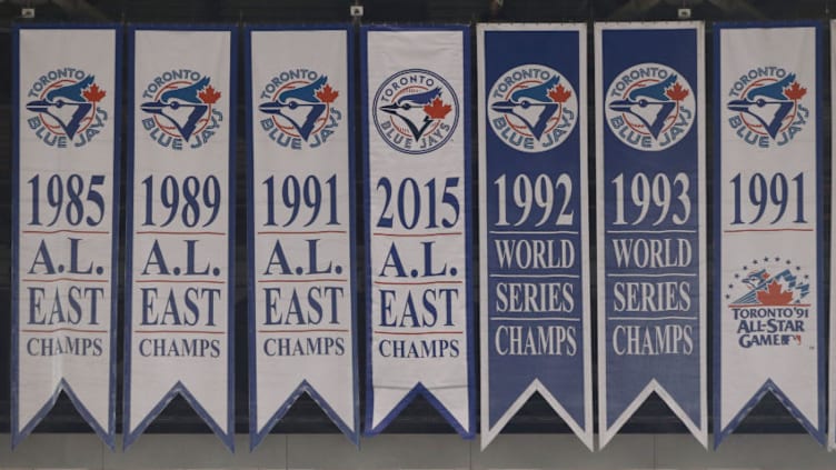 TORONTO, CANADA - OCTOBER 8: A new banner is unveiled above the jumbotron marking the Toronto Blue Jays division championship after winning the American League East title before the start of action against the Texas Rangers in Game One of the American League Division Series during the 2015 MLB Playoffs at Rogers Centre on October 8, 2015 in Toronto, Ontario, Canada. (Photo by Tom Szczerbowski/Getty Images)