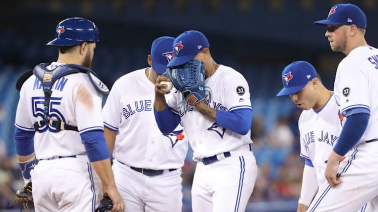 TORONTO, ON - APRIL 27: Marcus Stroman #6 of the Toronto Blue Jays reacts moments before being relieved after giving up a single in the sixth inning during MLB game action against the Texas Rangers at Rogers Centre on April 27, 2018 in Toronto, Canada. (Photo by Tom Szczerbowski/Getty Images)