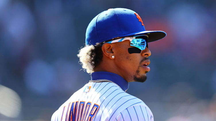 NEW YORK, NEW YORK - APRIL 08: Francisco Lindor #12 of the New York Mets in action against the Miami Marlins at Citi Field on April 08, 2021 in New York City. New York Mets defeated the Miami Marlins 3-2. (Photo by Mike Stobe/Getty Images)