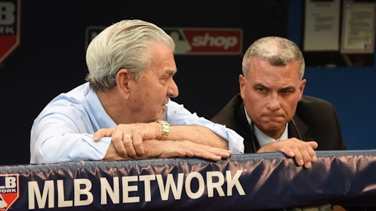 Oct 23, 2015; Kansas City, MO, USA; Kansas City Royals owner David Glass (left) with general manager Dayton Moore (right) before game six of the ALCS against the Toronto Blue Jays at Kauffman Stadium. Mandatory Credit: John Rieger-USA TODAY Sports