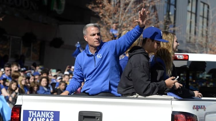 Nov 3, 2015; Kansas City, MO, USA; Kansas City Royals general manager Dayton Moore waves to fans at the World Series parade. Mandatory Credit: John Rieger-USA TODAY Sports