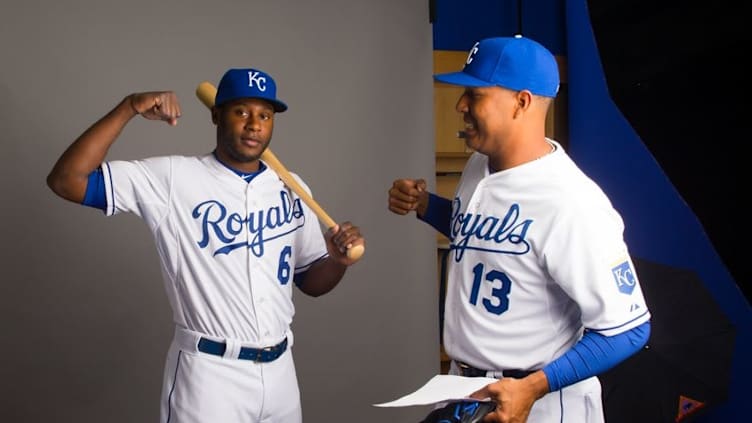 Feb 27, 2015; Surprise, AZ, USA; Kansas City Royals catcher Salvador Perez (right) tells outfielder Lorenzo Cain to flex for a portrait during photo day at Surprise Stadium. Mandatory Credit: Mark J. Rebilas-USA TODAY Sports