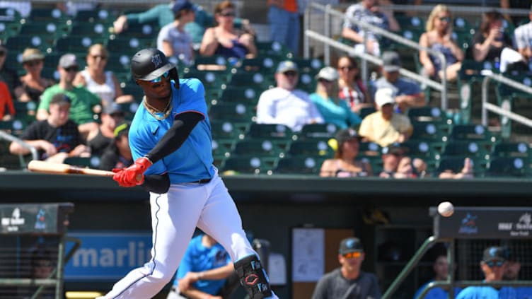 JUPITER, FLORIDA - MARCH 04: Monte Harrison #60 of the Miami Marlins singles in the fifth inning of a spring training game against the Baltimore Orioles at Roger Dean Chevrolet Stadium on March 04, 2020 in Jupiter, Florida. (Photo by Mark Brown/Getty Images)