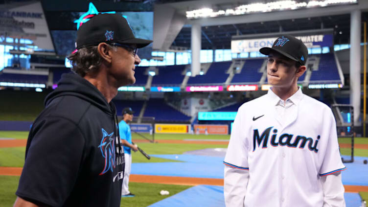 MIAMI, FLORIDA - JULY 23: Manager Don Mattingly #8 of the Miami Marlins speaks with draft pick Cody Morissette during batting practice prior to the game against the San Diego Padres at loanDepot park on July 23, 2021 in Miami, Florida. (Photo by Mark Brown/Getty Images)