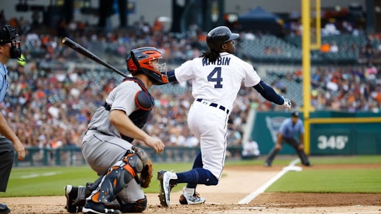 Jul 29, 2016; Detroit, MI, USA; Detroit Tigers center fielder Cameron Maybin (4) hits a single in the first inning against the Houston Astros at Comerica Park. Mandatory Credit: Rick Osentoski-USA TODAY Sports