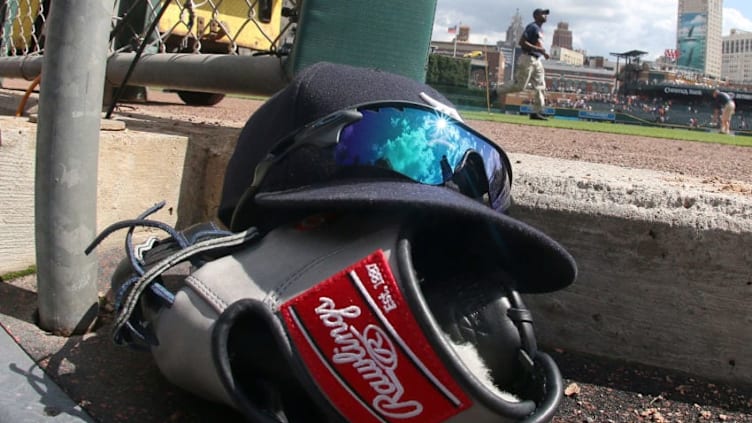 DETROIT, MI - JUNE 28: A Detroit Tigers hat, glasses and glove sit on the dugout stairs during a MLB game against the Chicago White Sox at Comerica Park on June 28, 2015 in Detroit, Michigan. The Tigers win on a walk off home run 5-4. (Photo by Dave Reginek/Getty Images)