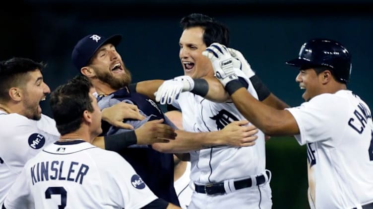 DETROIT, MI - SEPTEMBER 15: Mikie Mahtook #15 of the Detroit Tigers celebrates with Nicholas Castellanos #9 of the Detroit Tigers, Ian Kinsler #3 of the Detroit Tigers, Shane Greene #61 of the Detroit Tigers and Jeimer Candelario #46 of the Detroit Tigers after hitting a walk-off single in the ninth inning to drive in Candelario and defeat the Chicago White Sox 3-2 at Comerica Park on September 15, 2017 in Detroit, Michigan. (Photo by Duane Burleson/Getty Images)