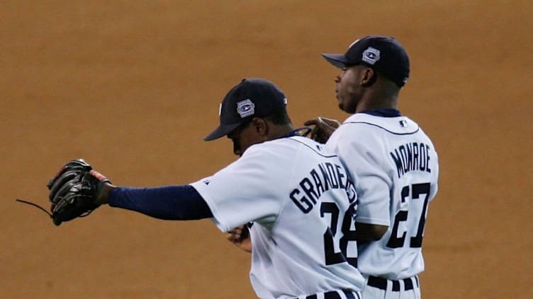 DETROIT - OCTOBER 22: Curtis Granderson #28 and Craig Monroe #27 of the Detroit Tigers celebrate after defeating the St. Louis Cardinals during Game Two of 2006 World Series October 22, 2006 at Comerica Park in Detroit, Michigan. The Tigers defeated the Cardinals 3-1 to tie the series 1-1. (Photo by Gregory Shamus/Getty Images)