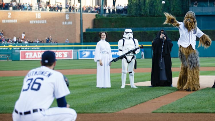 Sep 14, 2013; Detroit, MI, USA; Star War character Chewbacca throws out the ceremonial first pitch to Detroit Tigers relief pitcher Luke Putkonen (36) before the game against the Kansas City Royals at Comerica Park. Mandatory Credit: Rick Osentoski-USA TODAY Sports