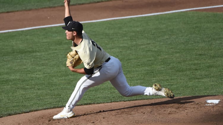 Jun 21, 2021; Omaha, Nebraska, USA; Vanderbilt Commodores pitcher Jack Leiter (22) pitches against the NC State Wolfpack in the first inning at TD Ameritrade Park. Mandatory Credit: Steven Branscombe-USA TODAY Sports