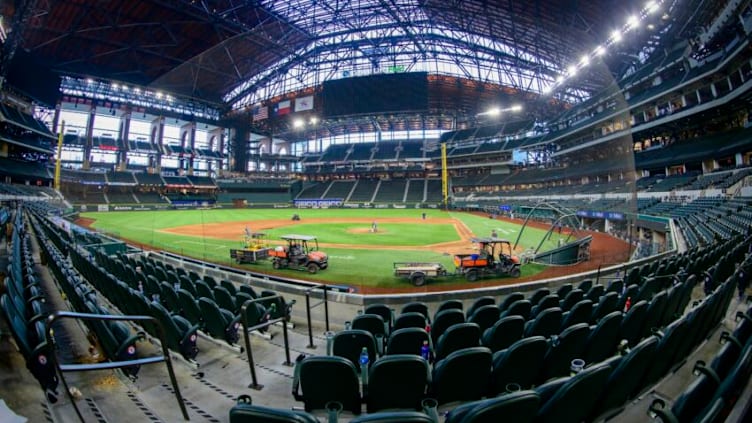 Sep 30, 2021; Arlington, Texas, USA; A view of the empty ballpark as the grounds crew tend to the field after the game between the Texas Rangers and the Los Angeles Angels Globe Life Field. Mandatory Credit: Jerome Miron-USA TODAY Sports