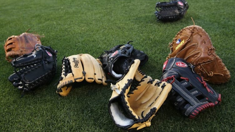 ANAHEIM, CA - APRIL 05: A view of baseball gloves prior to the game between the Los Angeles Angels of Anaheim and the Minnesota Twins on Opening Day at Angel Stadium on April 5, 2010 in Anaheim, California. (Photo by Stephen Dunn/Getty Images)